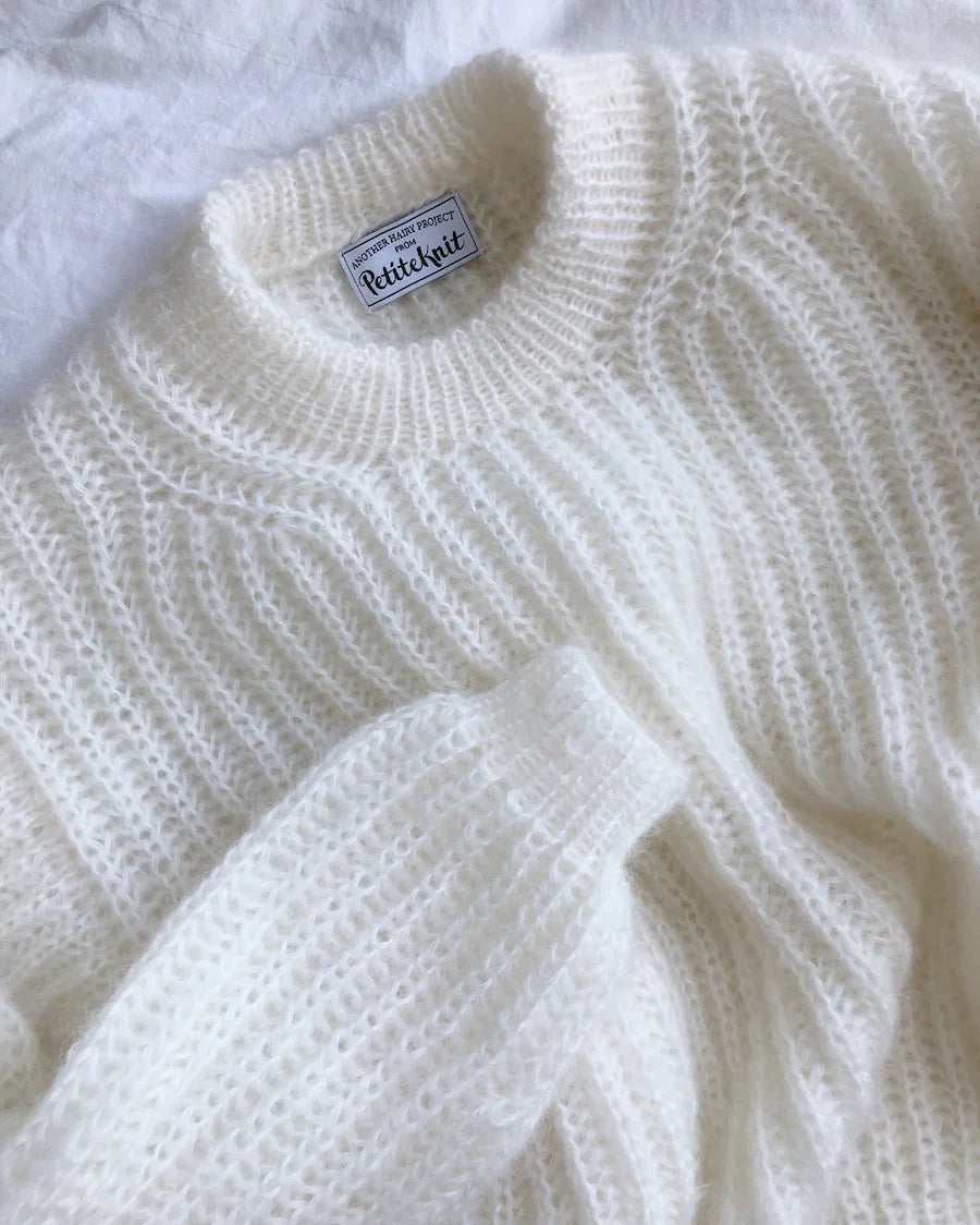 Kuvassa on PetiteKnit September Sweater -neuleen ohje (pattern).