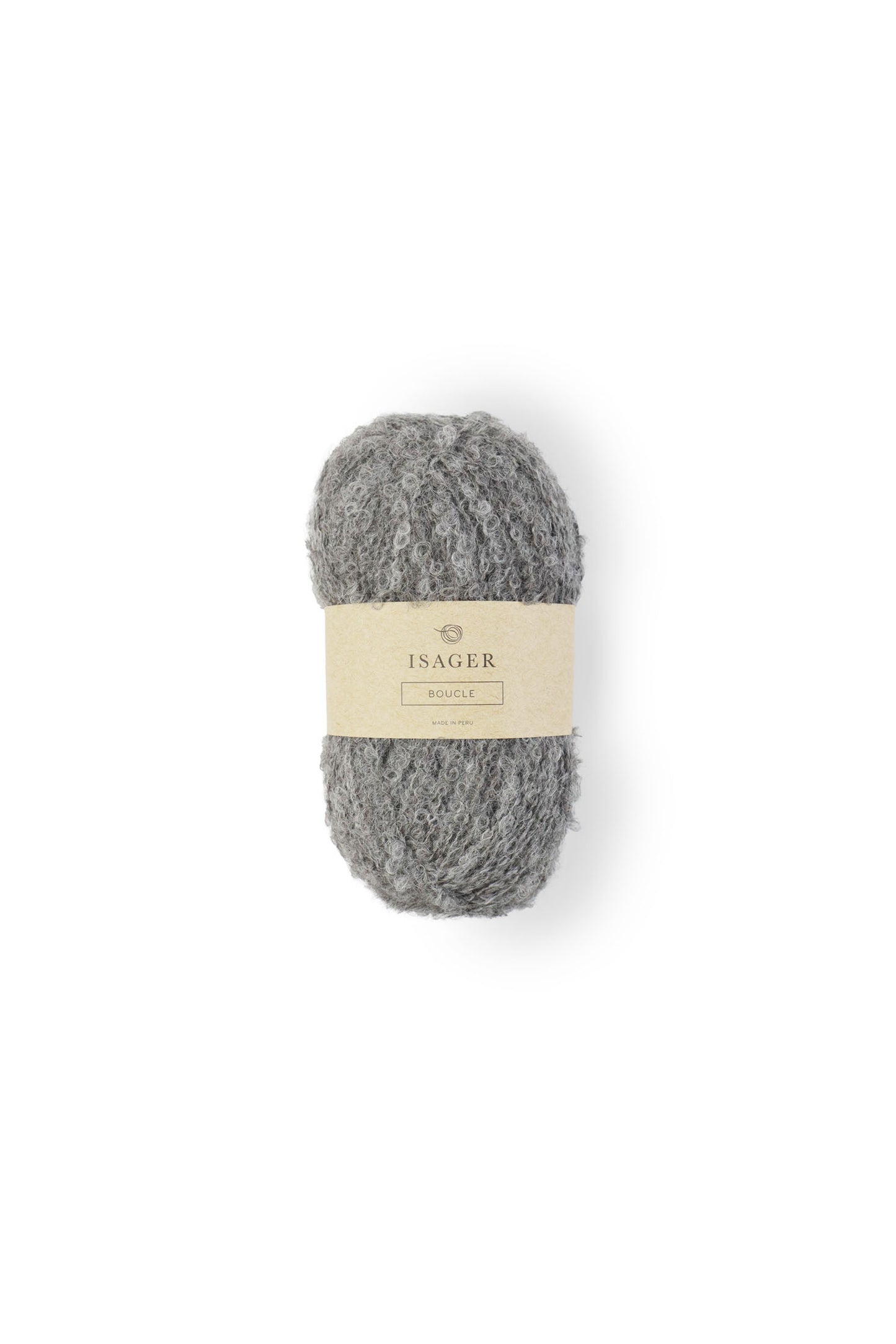 Kuvassa on Isager Bouclé -lankakerä (yarn) sävyssä E3s.