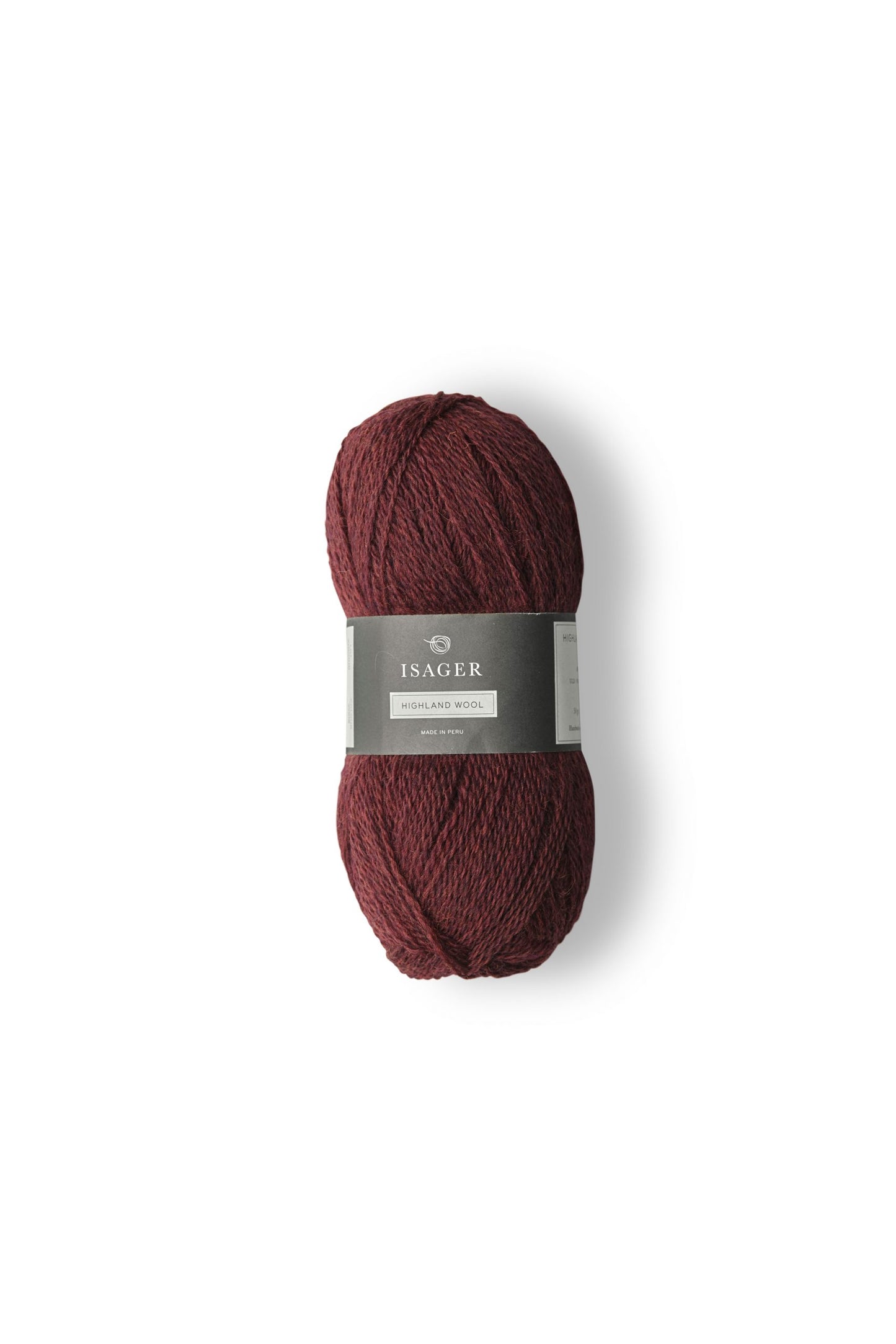 Kuvassa on Isager Highland wool -lankakerä värissä Wine.