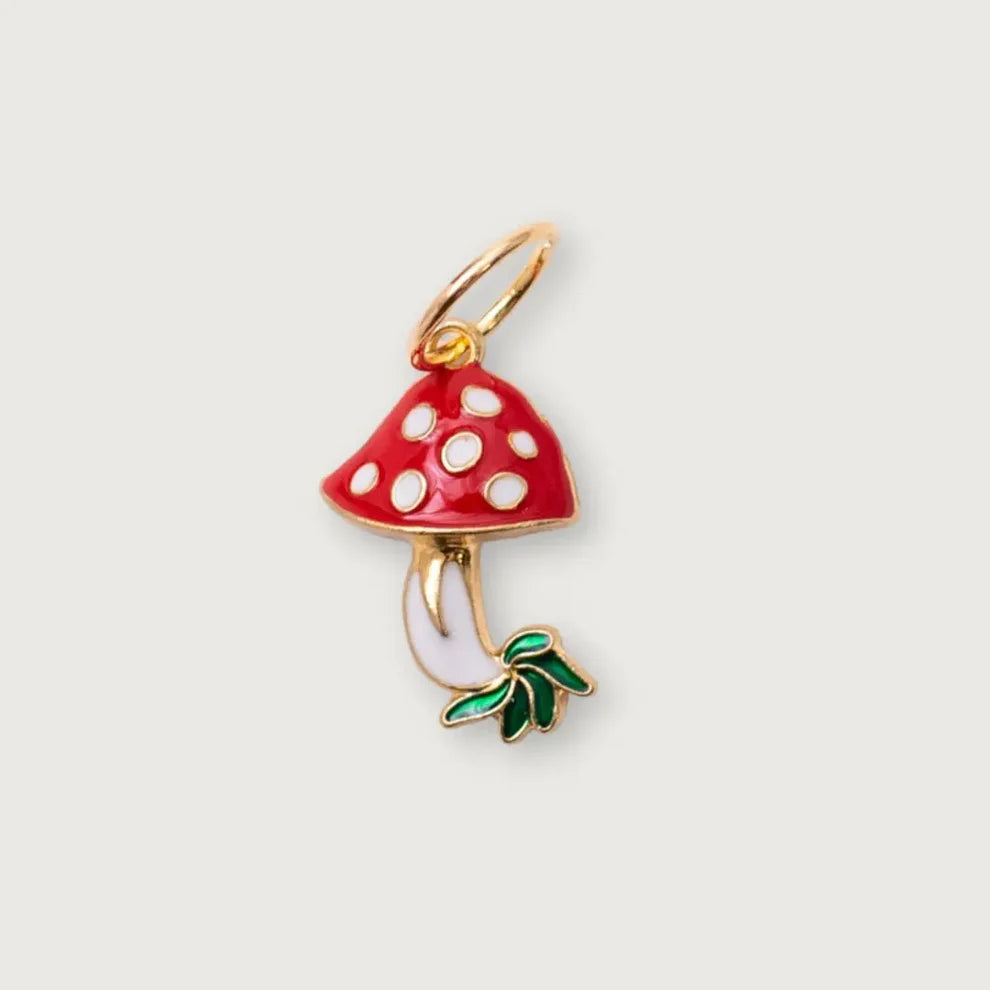 Kuvassa on Knits by Cindy Ekman silmukkamerkki (stitch marker) mushroom.