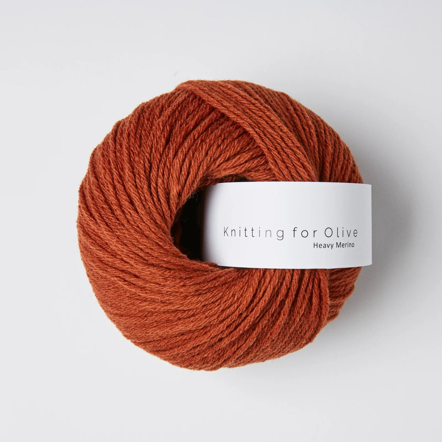 Kuvassa on Knitting for Olive Heavy Merino -lanka värissä Rust.