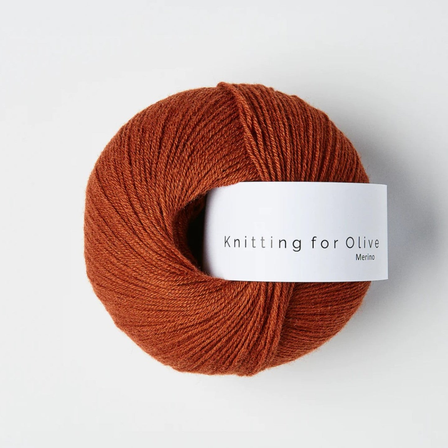 Kuvassa on Knitting for Olive Merino -lanka värissä Rust.