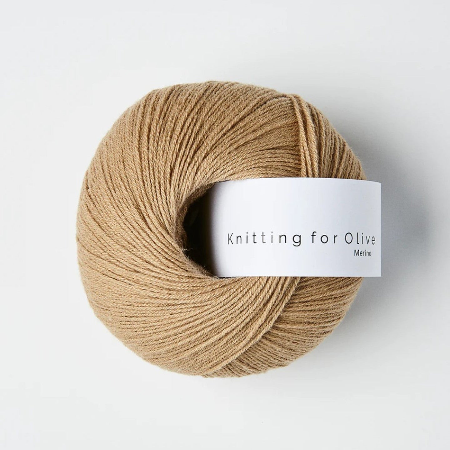Kuvassa on Knitting for Olive Merino -lanka värissä Trenchcoat.