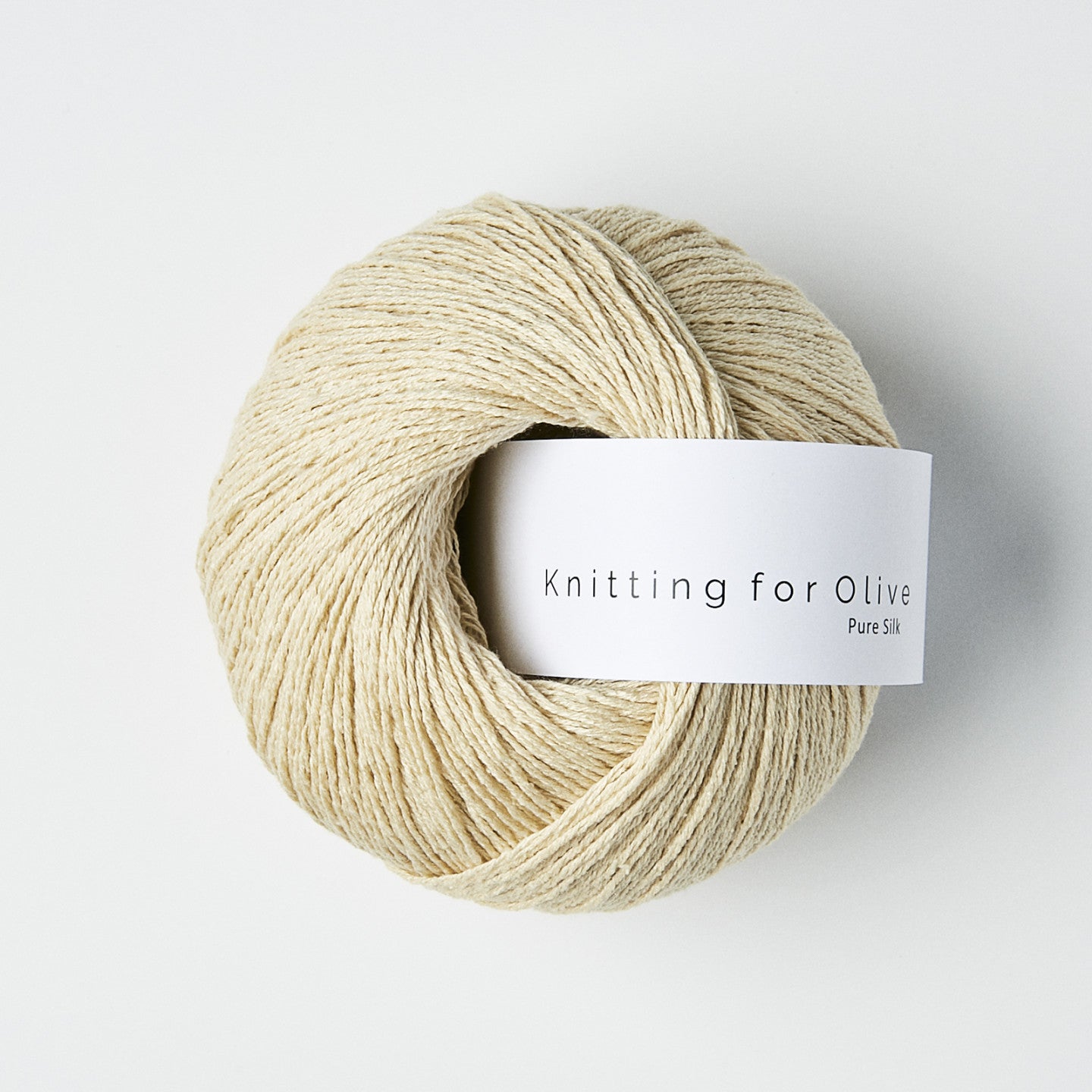 Kuvassa on Knitting for Olive Pure Silk -lanka värissä Wheat.