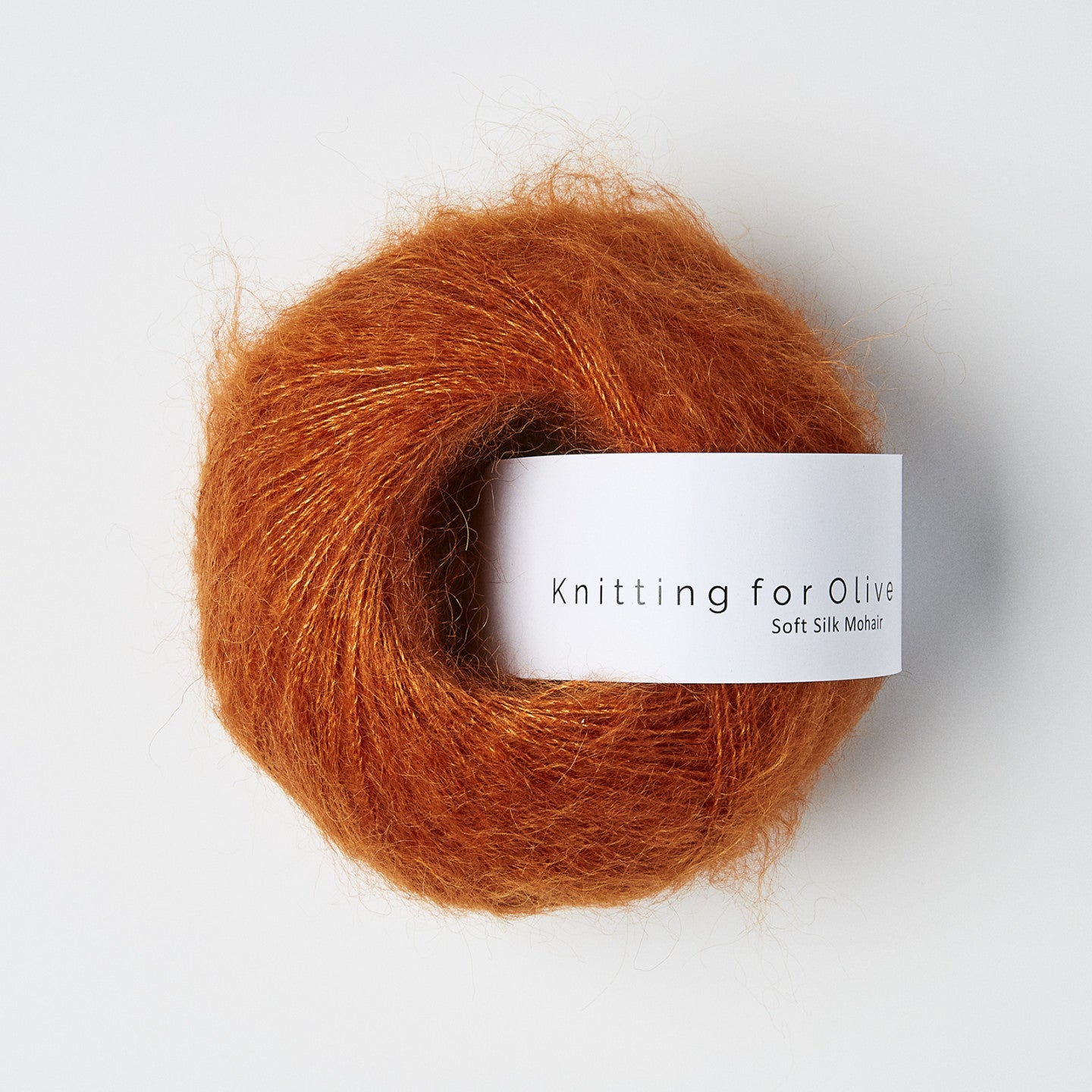 Kuvassa on Knitting for Olive Soft Silk Mohair -lanka (yarn) värissä Burnt Orange.