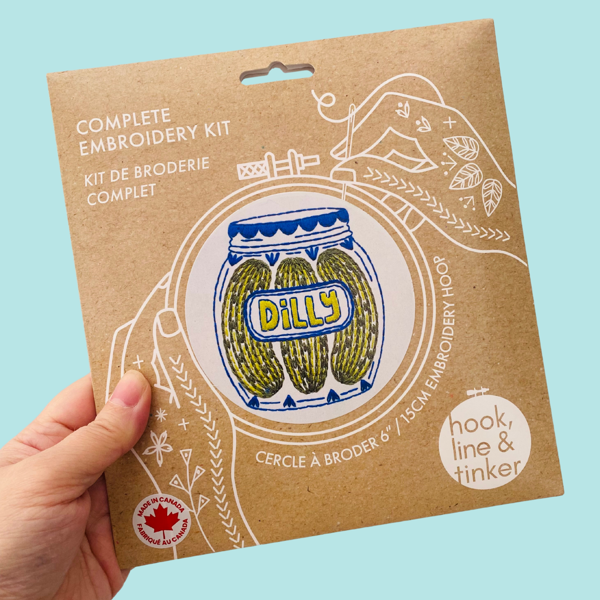 Kuvassa on Pickles-aiheinen kirjontasetti (embroidery kit).