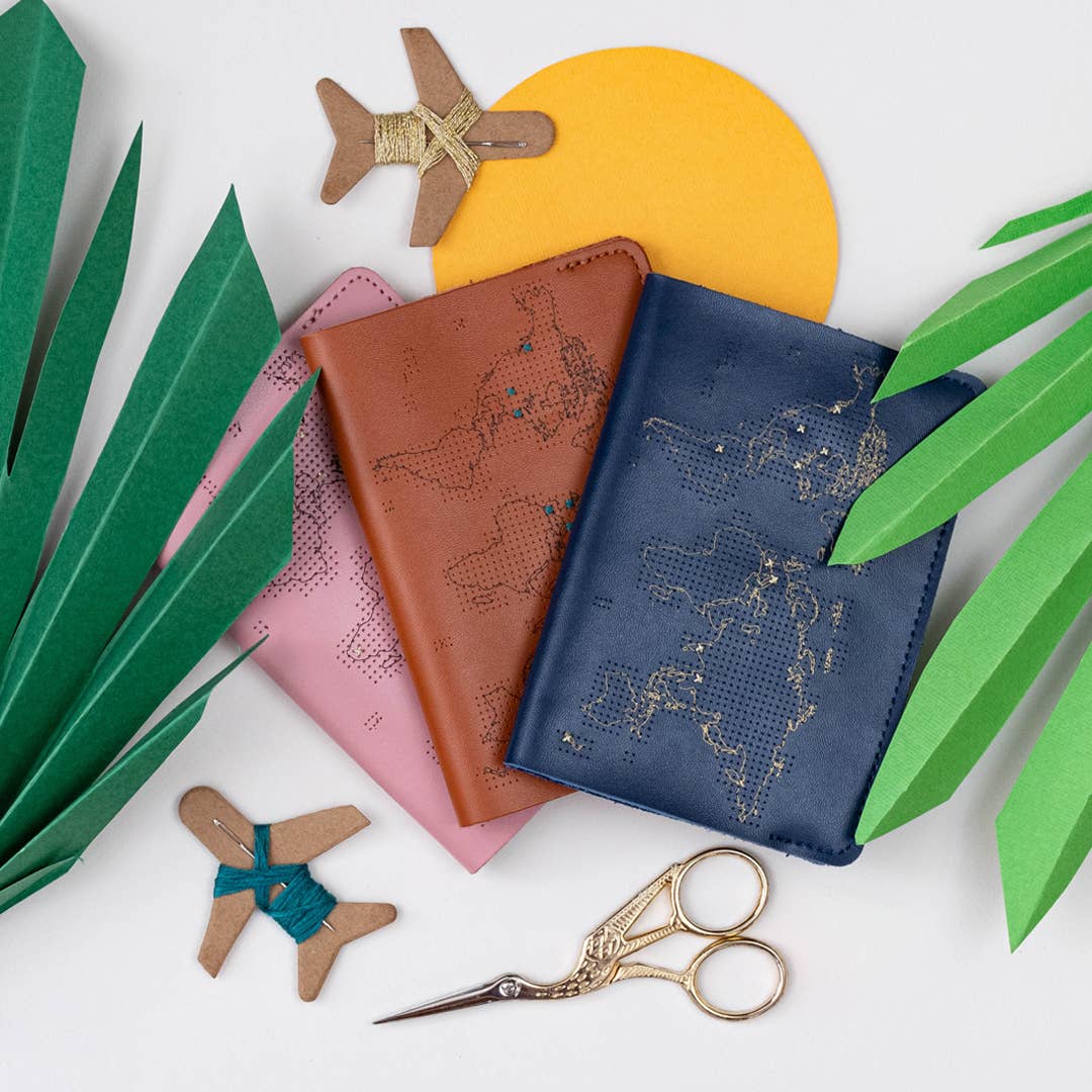 Passport cover ristipistokirjontaan ja matkamuistoihin